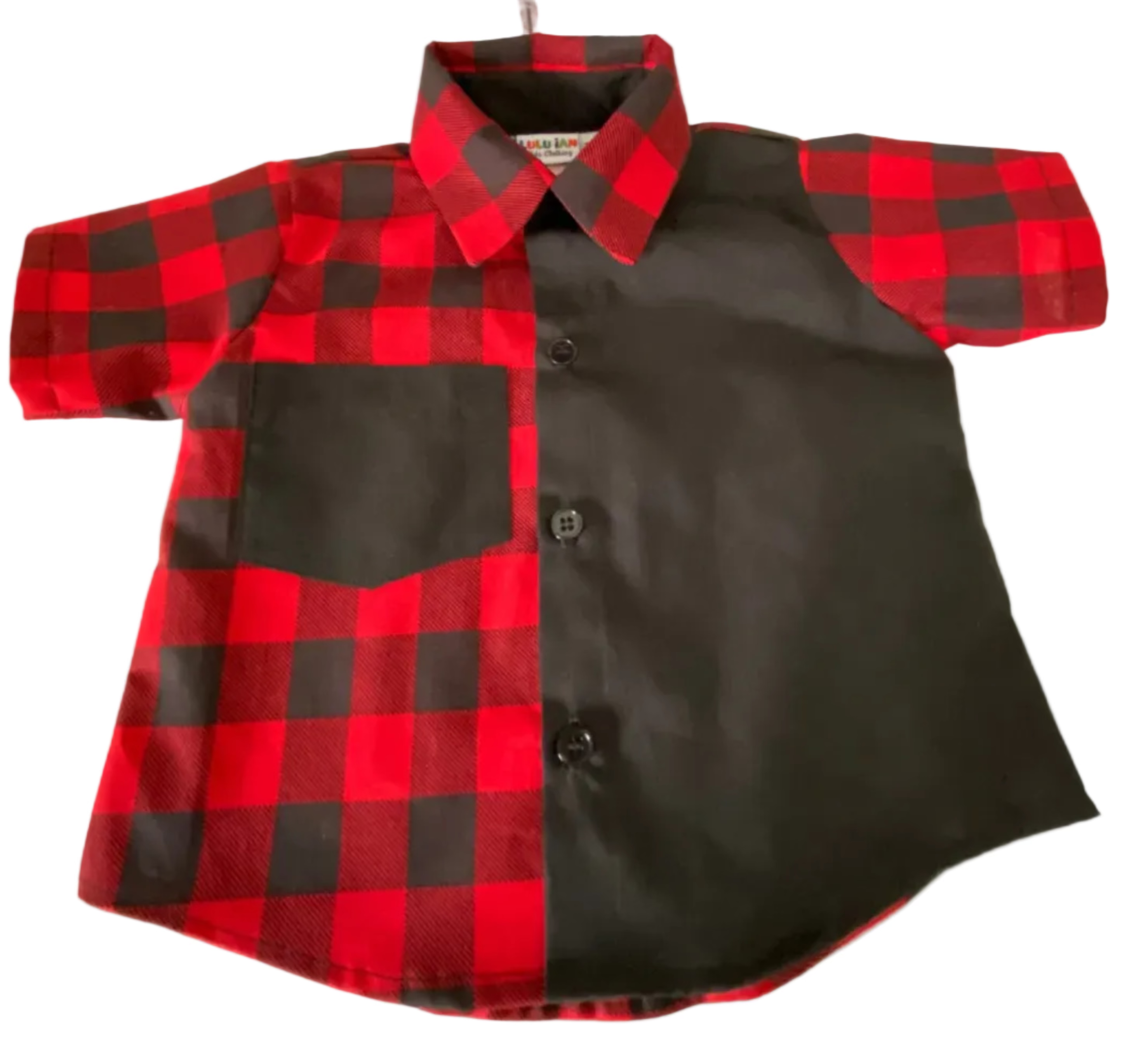 Red and black checkered shirt on a hanger against a white background