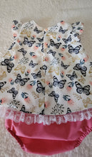 Load image into Gallery viewer, Baby outfit with butterfly pattern and pink bottom on a light background
