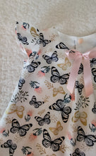 Load image into Gallery viewer, Dress with butterfly pattern and pink ribbon on a neutral background
